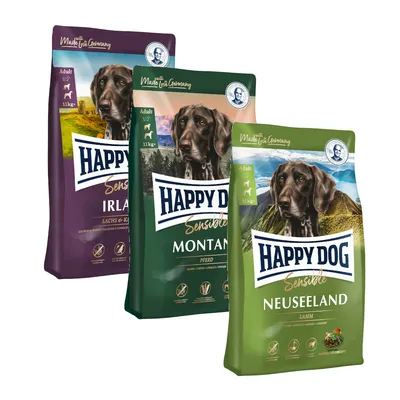 Kolme Happy Dog Sensible -koiranruokapussia: Ireland (lachs & kartoffel), Montana (pferd) ja Neuseeland (lamm), jokaisessa Adult 11 kg, Made in Germany -merkintä näkyvissä.