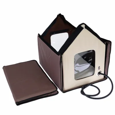 Brown and beige foldable pet house with transparent window, removable floor cushion and heating cable connection.