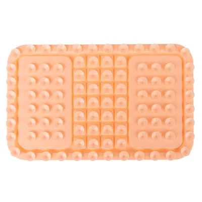 Silikonmatte mit Noppenstruktur, rechteckig, orangefarben. Geeignet für langsames Fressen oder Beschäftigung durch Lecken.