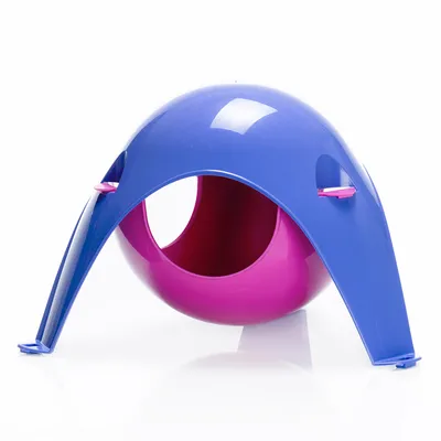 Plastic pet hideout with a pink spherical centre and blue arched legs, open entrance at the front, shown on a white background. No visible brand or text.