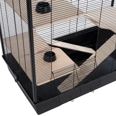 Small animal cage with black wire mesh walls, wooden platforms, ramps and integrated food bowls.