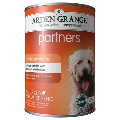 Tin labelled 'fresh chicken with rice', optimum nutrition with delicious fresh chicken, naturally hypoallergenic, not tested on animals, 395g.