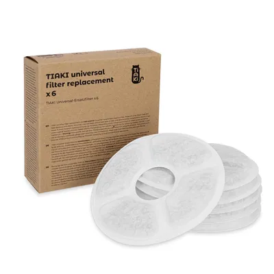 TIAKI filtru universal de rezervă x6. Ambalaj din carton cu descrierea produsului și șase filtre rotunde albe vizibile.