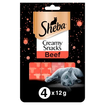 Sheba Creamy Snacks Beef, 4 x 12g. Visible packaging with a grey cat and red snack sachets. Brand name Sheba shown at top.