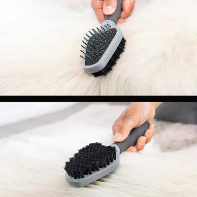 Two images showing a hand using a double-sided grooming brush with bristles and pins on light-coloured fur, demonstrating both sides in use for coat care.