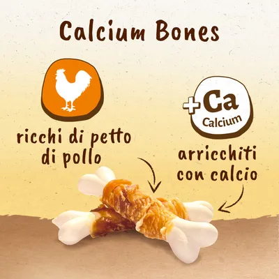 Calcium Bones, ricchi di petto di pollo, arricchiti con calcio. Immagine di due ossi avvolti da carne di pollo. Testo in parte in inglese e italiano.