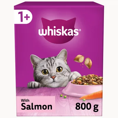 Dry food with salmon, 800g pack, suitable for pets aged 1 year and older. Image shows kibble pieces, a bowl, peas, and a carrot.