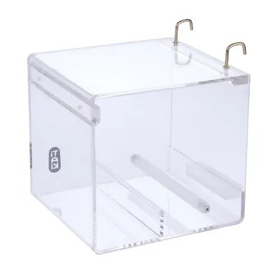 Transparent acrylic box with two metal hooks on top and side logo print 'Ista'.