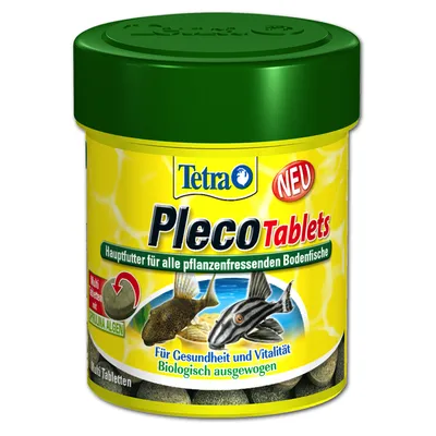 Tetra Pleco Tablets – основна храна за всички растителноядни дънни риби. Видими таблетки, снимки на две риби, текст на немски: Für Gesundheit und Vitalität, Biologisch ausgewogen.