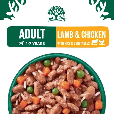 Adult 1-7 years lamb and chicken with rice and vegetables, shown as chunks in gravy with peas, carrots and rice visible in a bowl.