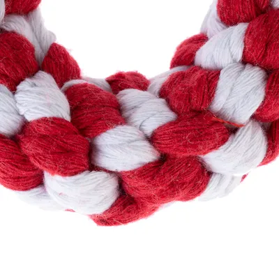 Fonott játék piros-fehér anyagból, háziállatok számára alkalmas.