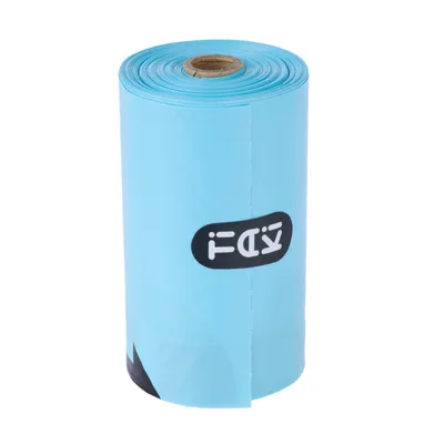 Rol met blauwe hondenpoepzakjes, logo 'FOX' zichtbaar aan de voorkant.