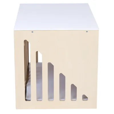 Holzbox mit weissen Oberflächen, seitliche Aussparungen in geometrischen Formen und gepolsterter Innenfläche.