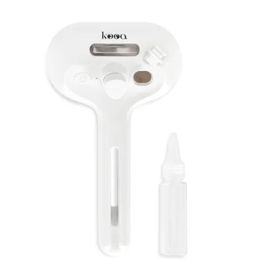 kooa device with white handle, dispensing opening and included refill bottle.