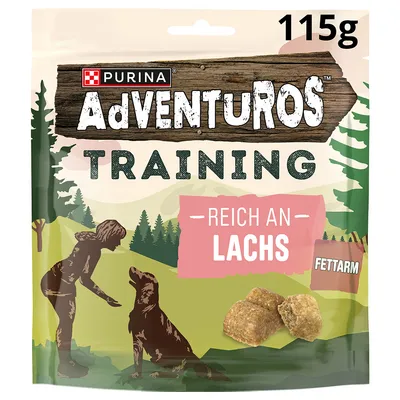 Purina Adventuros Training, rich in salmon, low fat, 115g. Packaging shows a dog, a female trainer, and training treats.