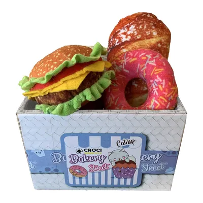 Croci Bakery Street Spielzeug-Set für Katzen, bestehend aus Plüsch-Burger, Donut und Croissant in dekorativer Verpackung mit Katzenmotiv.