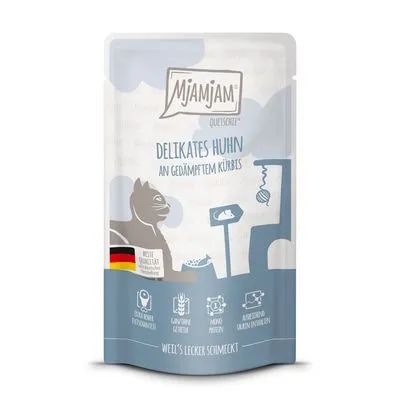 Mjamjam Delikates Huhn an gedämpftem Kürbis kattenvoer, Duitse vlag, pictogrammen: extra veel vlees, graanvrije receptuur, zonder toegevoegde suikers, weil’s lecker schmeckt.