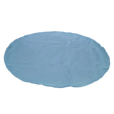 Tapis rond bleu uni, surface lisse sans motifs ni texte visible, matériau plastique apparent.