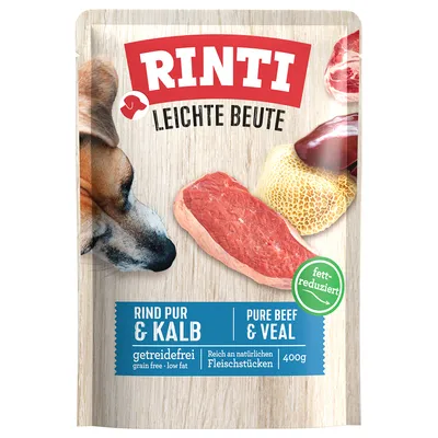 RINTI LEICHTE BEUTE Rind pur & Kalb, getreidefrei, riche en morceaux de viande naturels, 400 g, étiquette vert « fett-reduziert », image de chien et morceaux de viande visibles sur l’emballage.