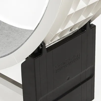 Close-up view of a Cat in Motion product, Made in Germany, with black base and white structure.