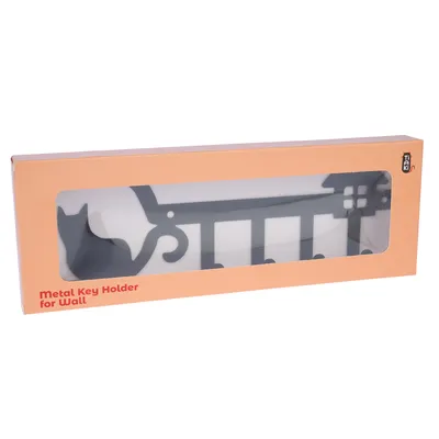 Metallschlüsselhalter für die Wand, Verpackung mit Sichtfenster zeigt schwarzen Schlüsselhalter in Katzenform. Markenname Taki sichtbar.