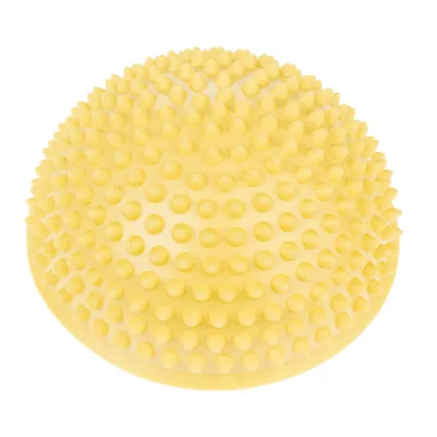 Palla da massaggio gialla con superficie a nodi, adatta per stimolazione e rilassamento tramite massaggio a pressione.