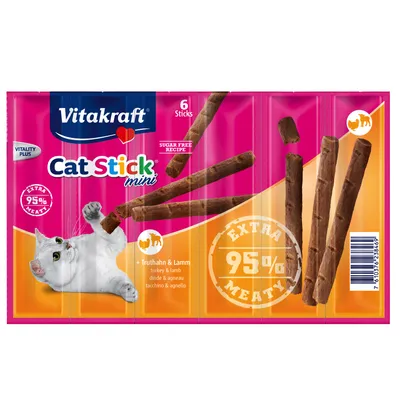 Confezione Vitakraft Cat Stick mini, 6 sticks, tacchino e agnello, ricetta senza zucchero, extra 95% meaty, immagine di gatto bianco e bastoncini visibili sulla confezione.