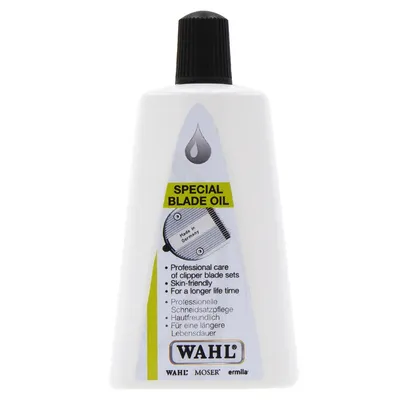 Flacon d’huile pour lames WAHL, texte visible : SPECIAL BLADE OIL, Professional care of clipper blade sets, Skin-friendly, For a longer life time, Made in Germany.