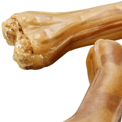 Lähikuva puristetusta puruluusta, luonnollista materiaalia, sopii koirille.