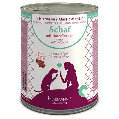 Hermmann's Classic Menü Schaf mit Haferflocken, complete food for dogs of all ages, extra Fleisch-Stücke, Herrmann's Manufaktur. Dåse med tysk og engelsk tekst synlig.