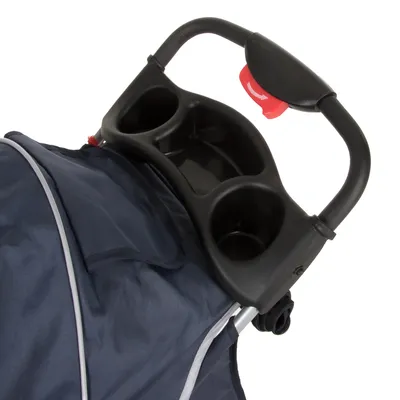 Poignée de poussette pour animal avec plateau en plastique noir, deux porte-gobelets et un compartiment central, bouton rouge visible sur la poignée.