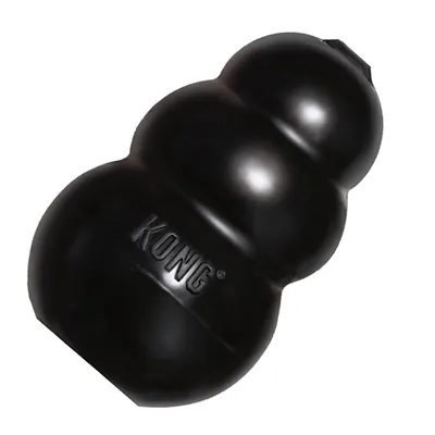 Giocattolo per cani in gomma nera con marchio KONG visibile sulla superficie.