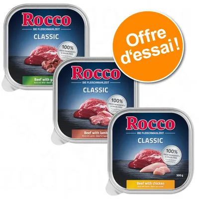 Rocco Classic pâtée pour chien, variétés visibles : bœuf avec gibier, bœuf avec agneau, bœuf avec poulet, 300 g. Texte visible : Offre d’essai ! 100 % ingrédients frais & sans céréales.