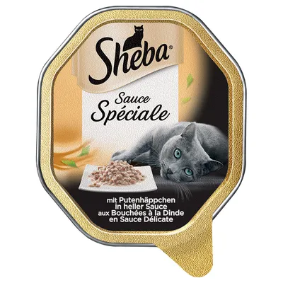 Sheba Sauce Spéciale, mit Putenhäppchen in heller Sauce. Billede af grå kat og skål med foder på emballagen.