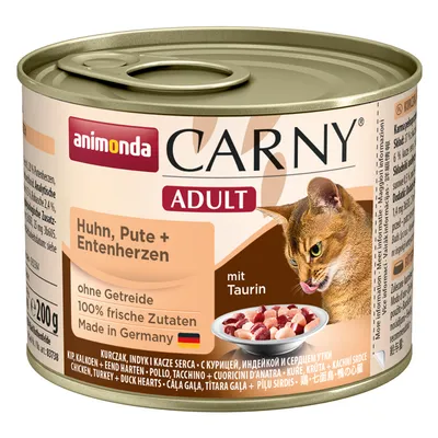 Conservă animonda Carny Adult pentru pisici, Huhn, Pute + Entenherzen, fără cereale, 100% ingrediente proaspete, cu taurină, 200 g. Imagine cu pisică și bol cu hrană.