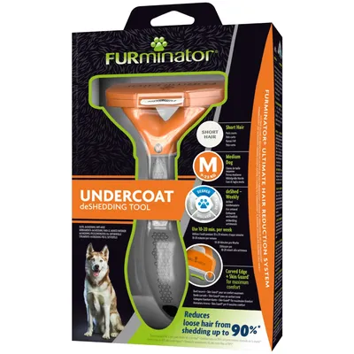 Herramienta Furminator Undercoat deShedding Tool para perros medianos de 9–23 kg y pelo corto. Reduce la caída de pelo hasta un 90 %. Uso recomendado: 10–20 min por semana.