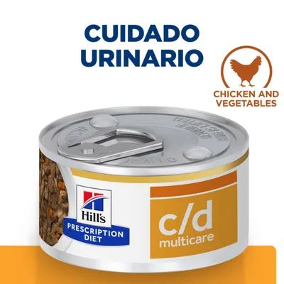 Lata Hill's Prescription Diet c/d Multicare. Texto visible: CUIDADO URINARIO, chicken and vegetables. Etiqueta con logotipo Hill's y c/d multicare.