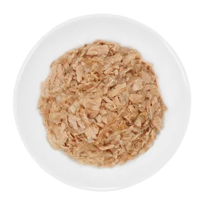 Shredded wet food served on a white plate, showing texture and portion size for product comparison.