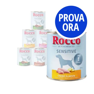 Rocco Sensitive, diverse lattine di alimento per cani visibili. In primo piano variante Chicken & potato 800 g. Testo in evidenza: PROVA ORA.