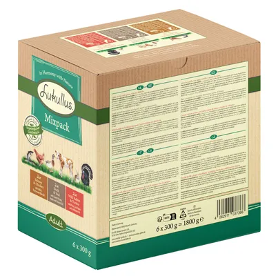 Lukullus Mixpack Adult, 6 x 300 g. Sorten: Huhn & Kalb, Rind & Truthahn, Wild & Kaninchen. Ungeöffnetes Nassfutter in Kartonverpackung mit Zutatenliste und Nährwertangaben.