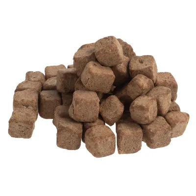 Brown, cube-shaped dry food pieces stacked. Product image without visible brand or text information.