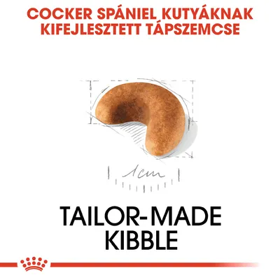 Cocker spániel kutyáknak kifejlesztett tápszemcse, 1 cm-es méretjelzéssel. Tailor-made kibble felirat látható.