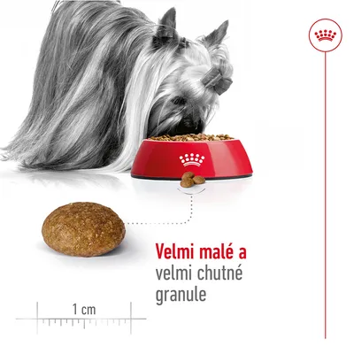 Pes u misky s granulemi, detail jedné granule vedle měřítka 1 cm. Text: Velmi malé a velmi chutné granule.