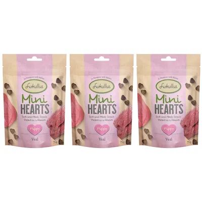 Lot de 3 sachets Lukullus Mini Hearts Puppy Veal, 75 g chacun. Texte visible : Soft and Meaty Snack Perfect as a Reward. Emballage rose avec morceaux en forme de cœur.