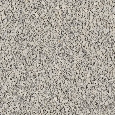 Close-up of grey, granular cat litter with fine texture.
