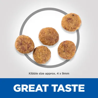 Round kibble pieces shown with text stating kibble size approximately 4 by 9 millimetres and the phrase great taste.