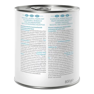 Tin labelled: Fresh salmon & chicken with forest berries, roots and wild herbs. 100% grain-free recipe. Complete food for growing dogs. Net weight: 800g.