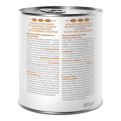 Tin labelled: Fresh wild boar with forest berries, roots and wild herbs. 100% grain-free recipe. Complete food for adult dogs of all breeds. Content: 800g.