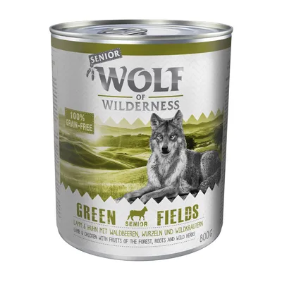 Lata de comida para perros Wolf of Wilderness Senior Green Fields, 800 g. Texto visible: 100 % grain-free, cordero y pollo con frutos del bosque, raíces y hierbas silvestres.