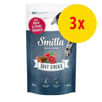 Smilla Soft Sticks, sachet 50 g, avec canard et grenade, lot de 3. Texte visible : grain-free recipe, with tasty duck, made in Germany. Image de bâtonnets et grenade.